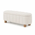 Panca imbottita in tessuto beige con gambe in legno
